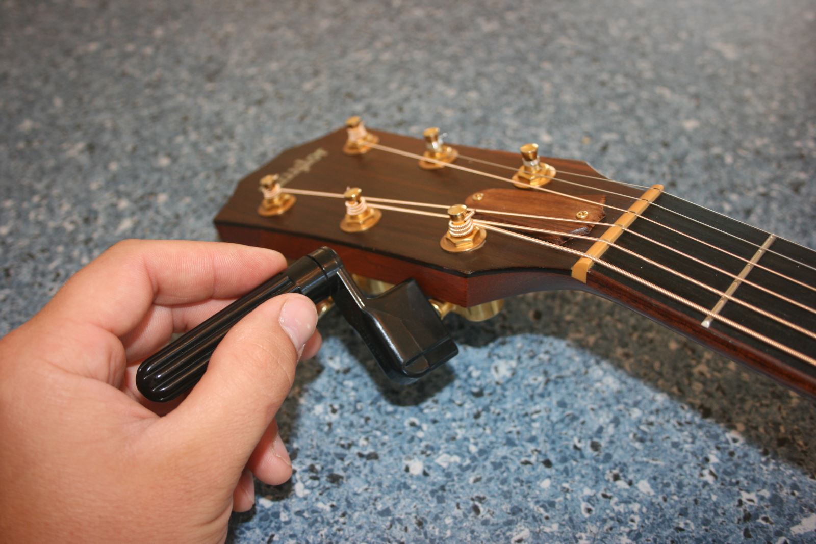 How to Change a String on an Acoustic Guitar